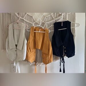 FP Movement by Free People Vest Trio in Cream, Orange, and Black 3 tops